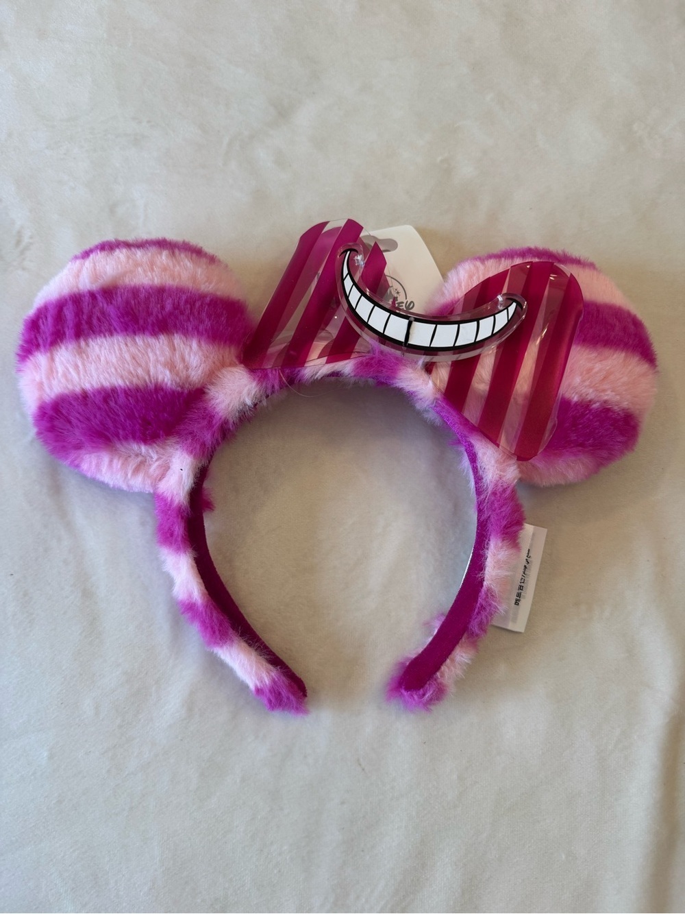 Brand new! Disney Parks Cheshire Cat Plush Ear Headband – Alice in Wonderland